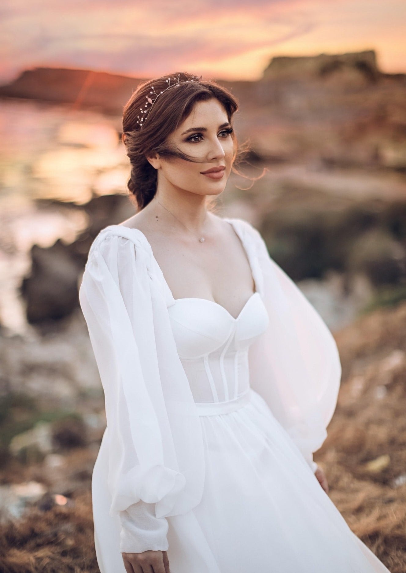 Model wearing the RAYAN hair vine, crafted with pearls, leaves, and crystal accents.